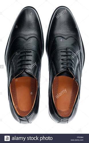 classic-male-black-leather-shoes-isolated-on-a-white-top-view-FPX39H