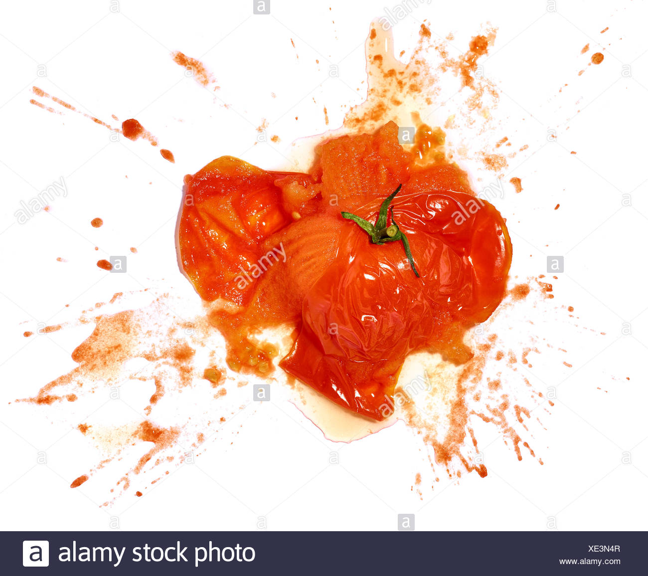smashed-tomato-on-white-background-XE3N4R